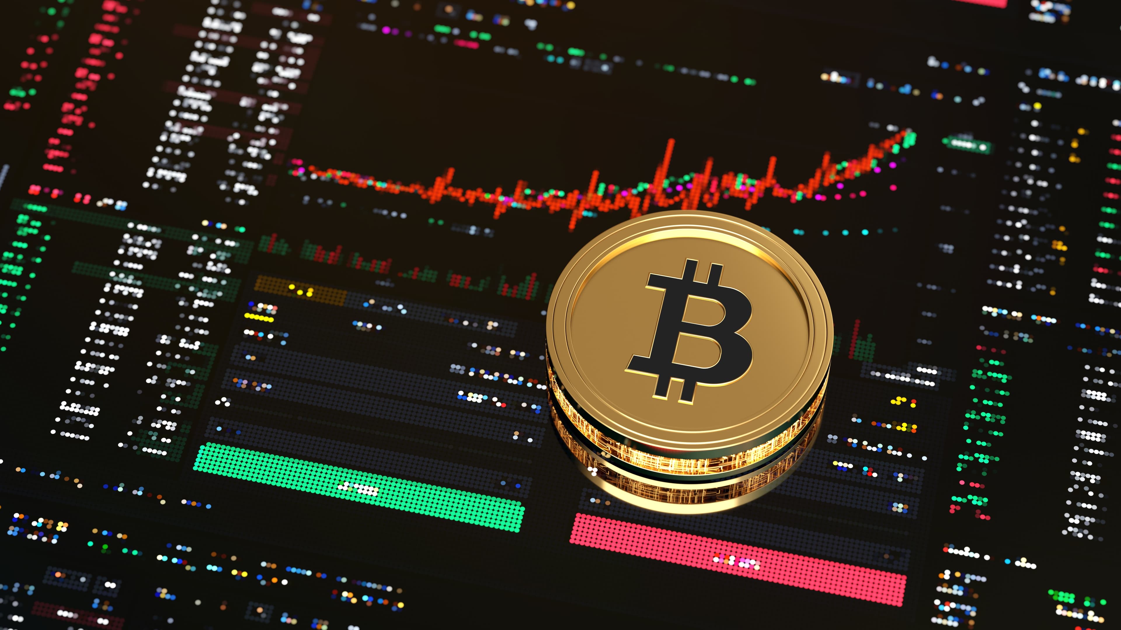 Imagem representativa de um bitcoin sobre um gráfico