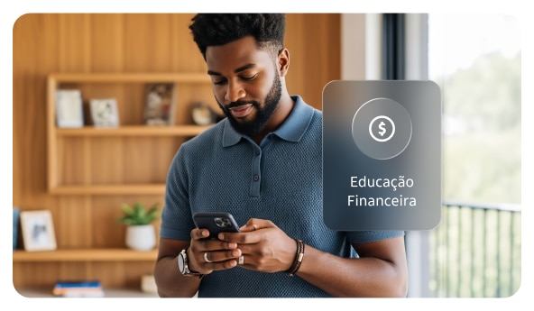 Homem de barba e camisa azul utilizando seu notebook